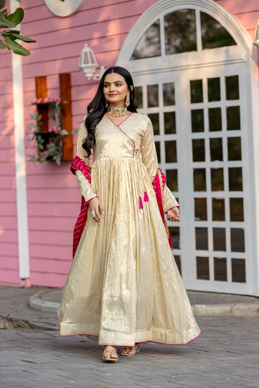 Unveil your inner star with the Celestial Elegance Gown Made from Sparkling Jequard Butti Paired with a Vibrant Digital Printed Chinon Dupatta.