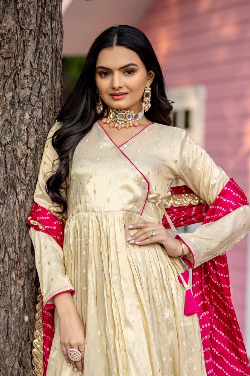 Unveil your inner star with the Celestial Elegance Gown Made from Sparkling Jequard Butti Paired with a Vibrant Digital Printed Chinon Dupatta.