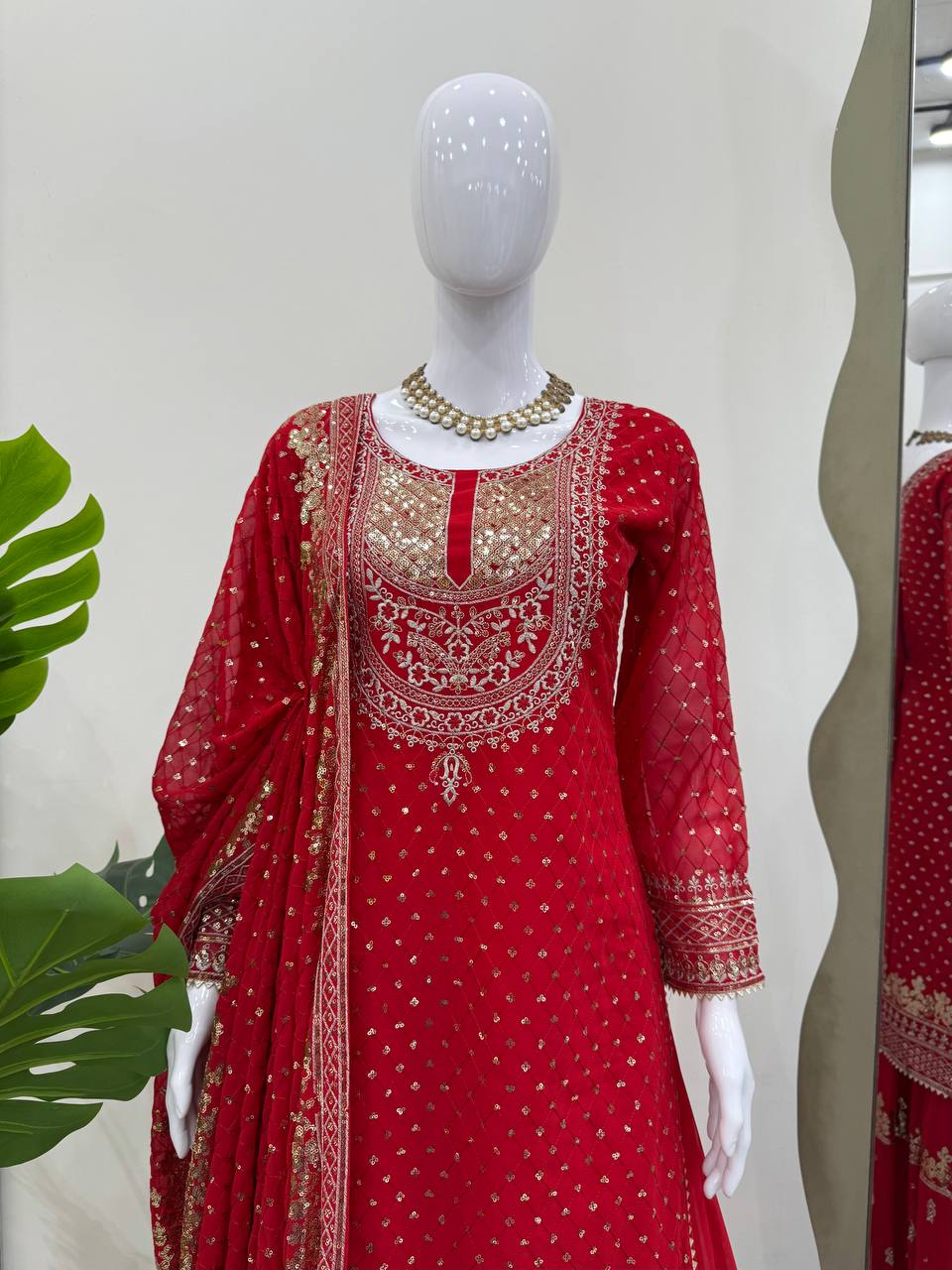 Green And Red Embroidered Sharara Suit with Dupatta Components: