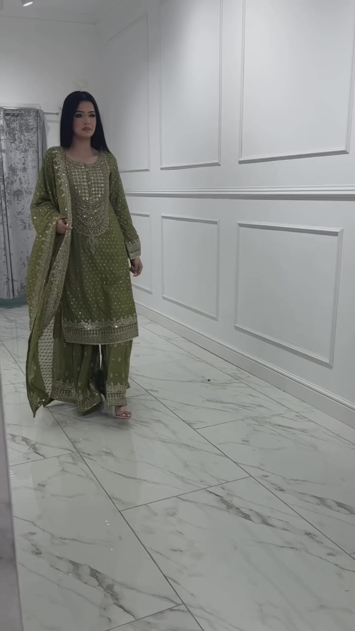 Green And Red Embroidered Sharara Suit with Dupatta Components: